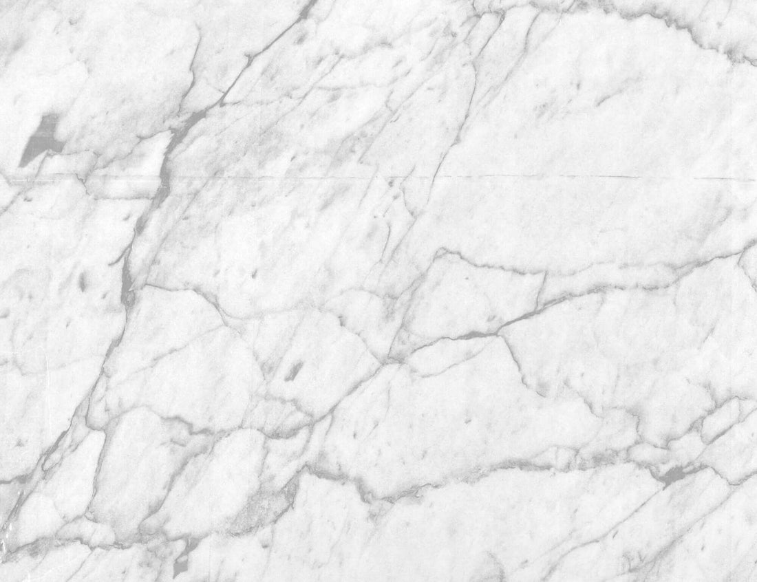 Stilvoller Herdabdeckplatte mit Granitoptik auf einer modernen Kücheninsel mit natürlicher Beleuchtung