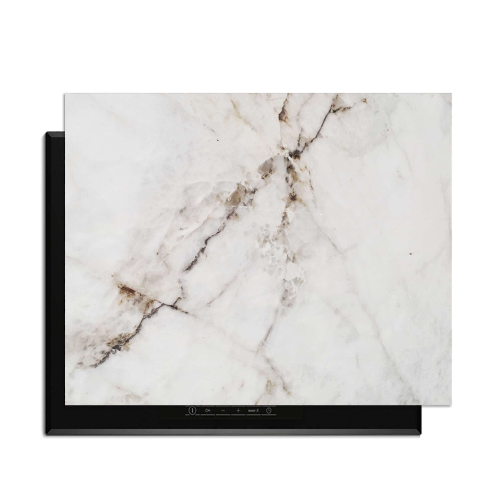 Pure Marble - Herdabdeckplatte auf einem Induktionskochfeld mit elegantem Marmordesign.