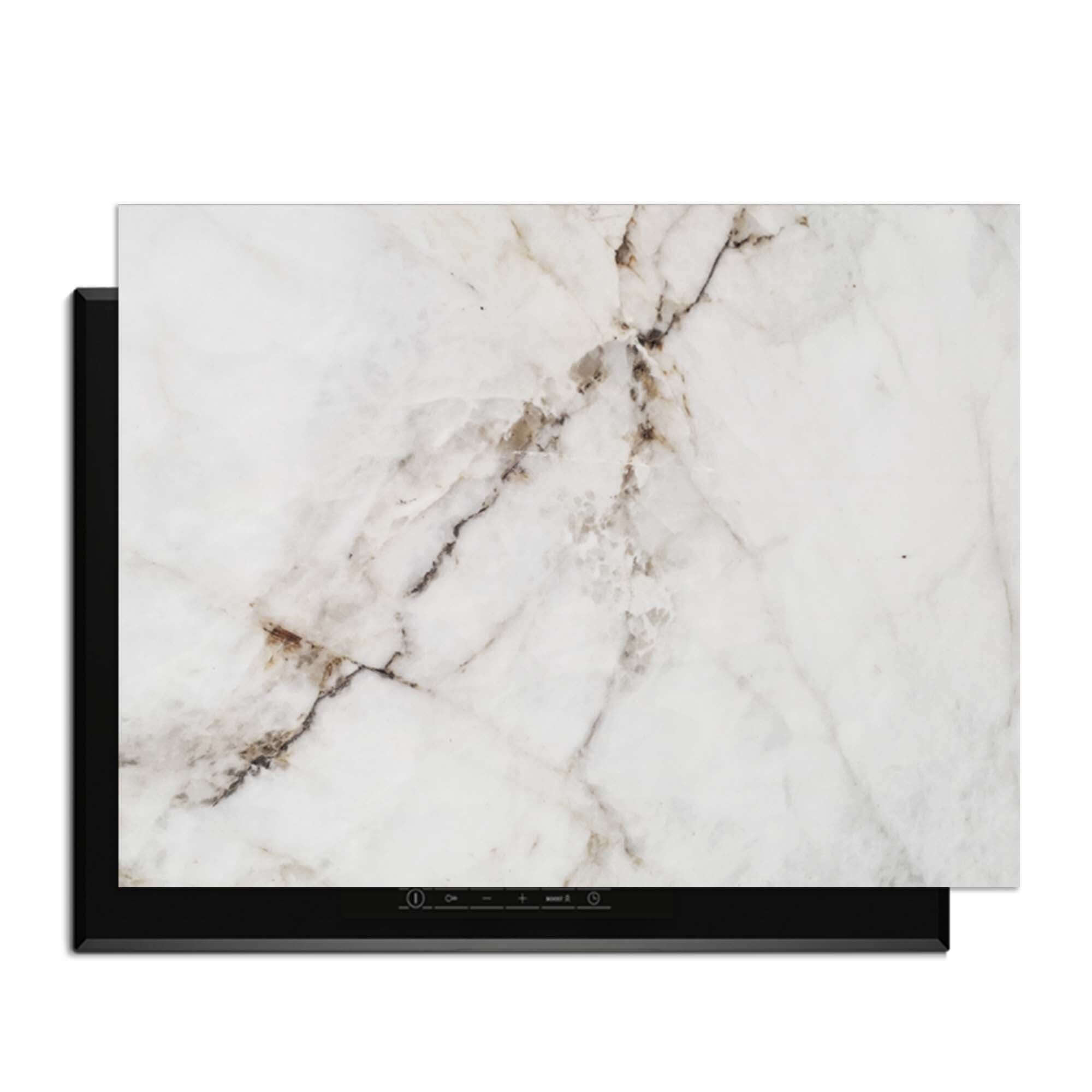 Pure Marble - Herdabdeckplatte auf einem Induktionskochfeld, elegantes und luxuriöses Marmor-Design.
