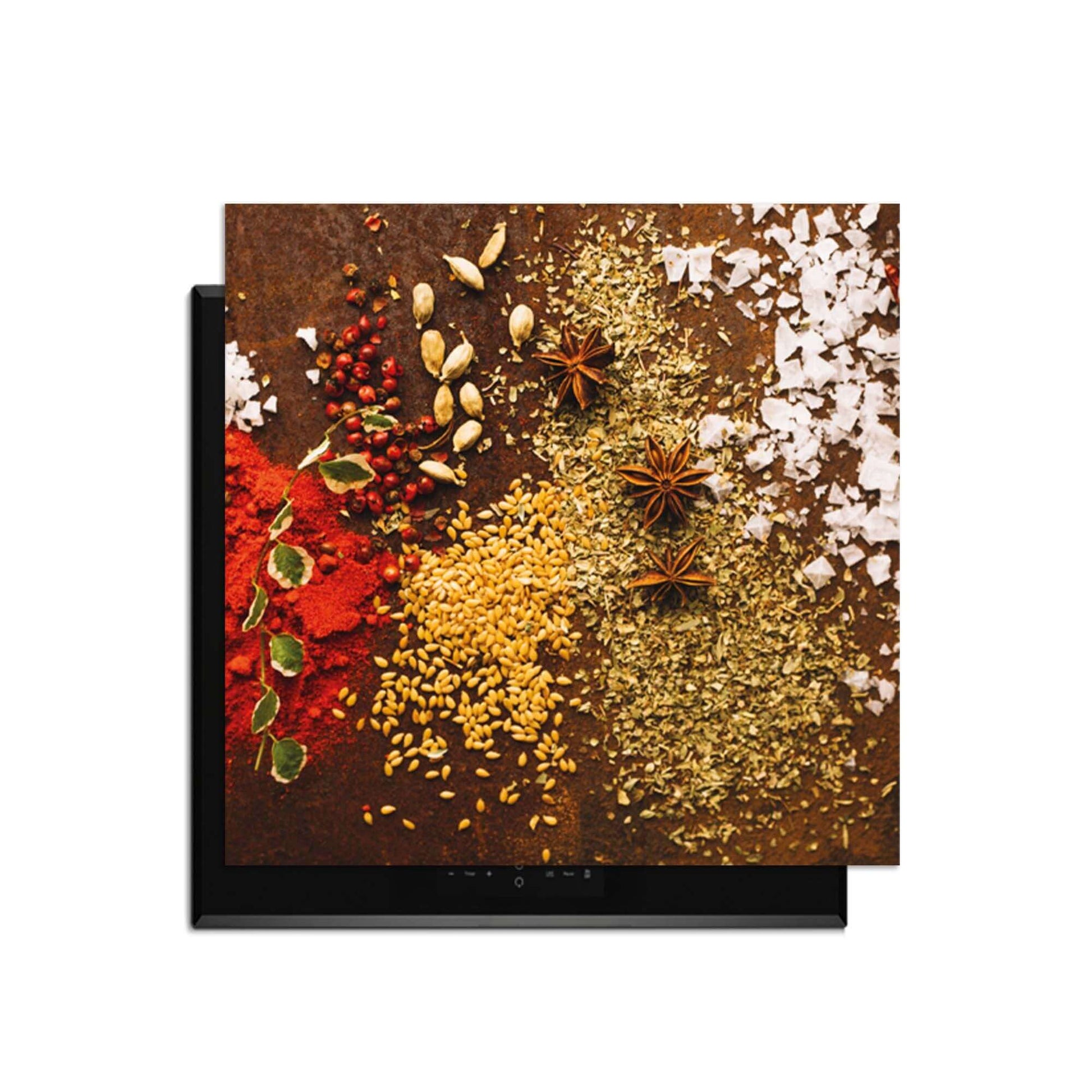Spice Symphony - Herdabdeckplatte mit bunten Gewürzen auf einem Induktionskochfeld.
