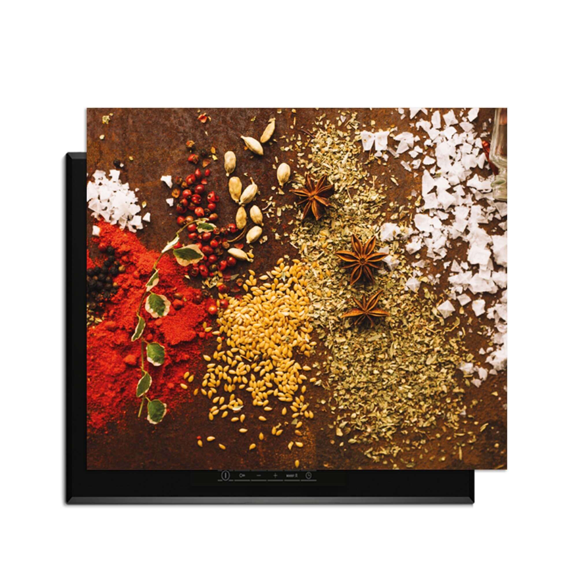 Spice Symphony - Herdabdeckplatte mit bunten Gewürzen auf einem Kochfeld.