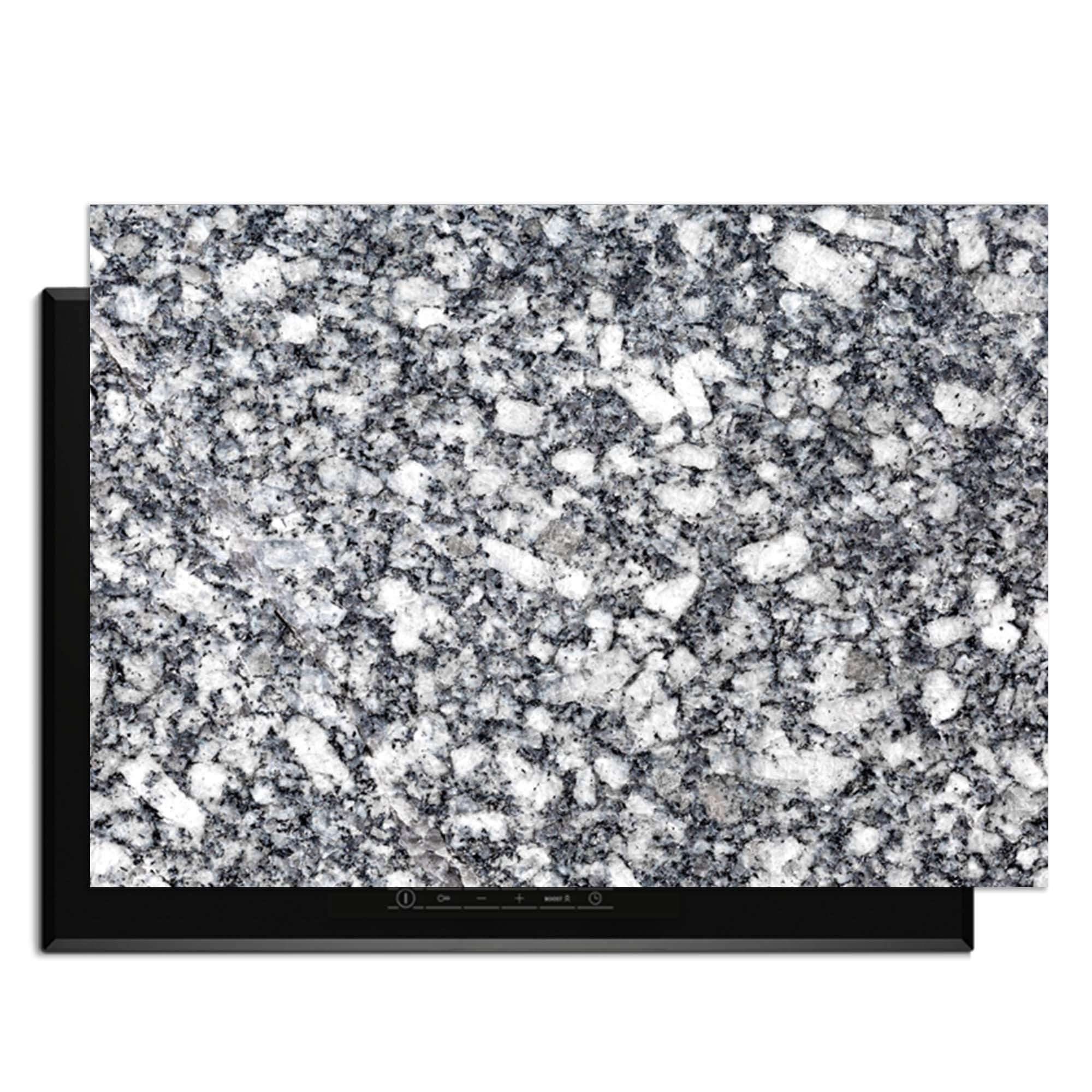 Midnight Granite - Herdabdeckplatte mit reicher Granittextur, ideal für eine Luxusküche.