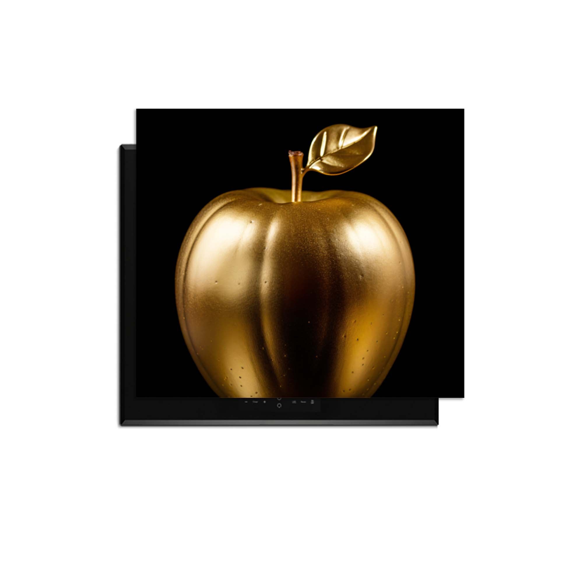 Eve's Edition - Herdabdeckplatte mit einem eleganten goldenen Apfel auf schwarzem Hintergrund.