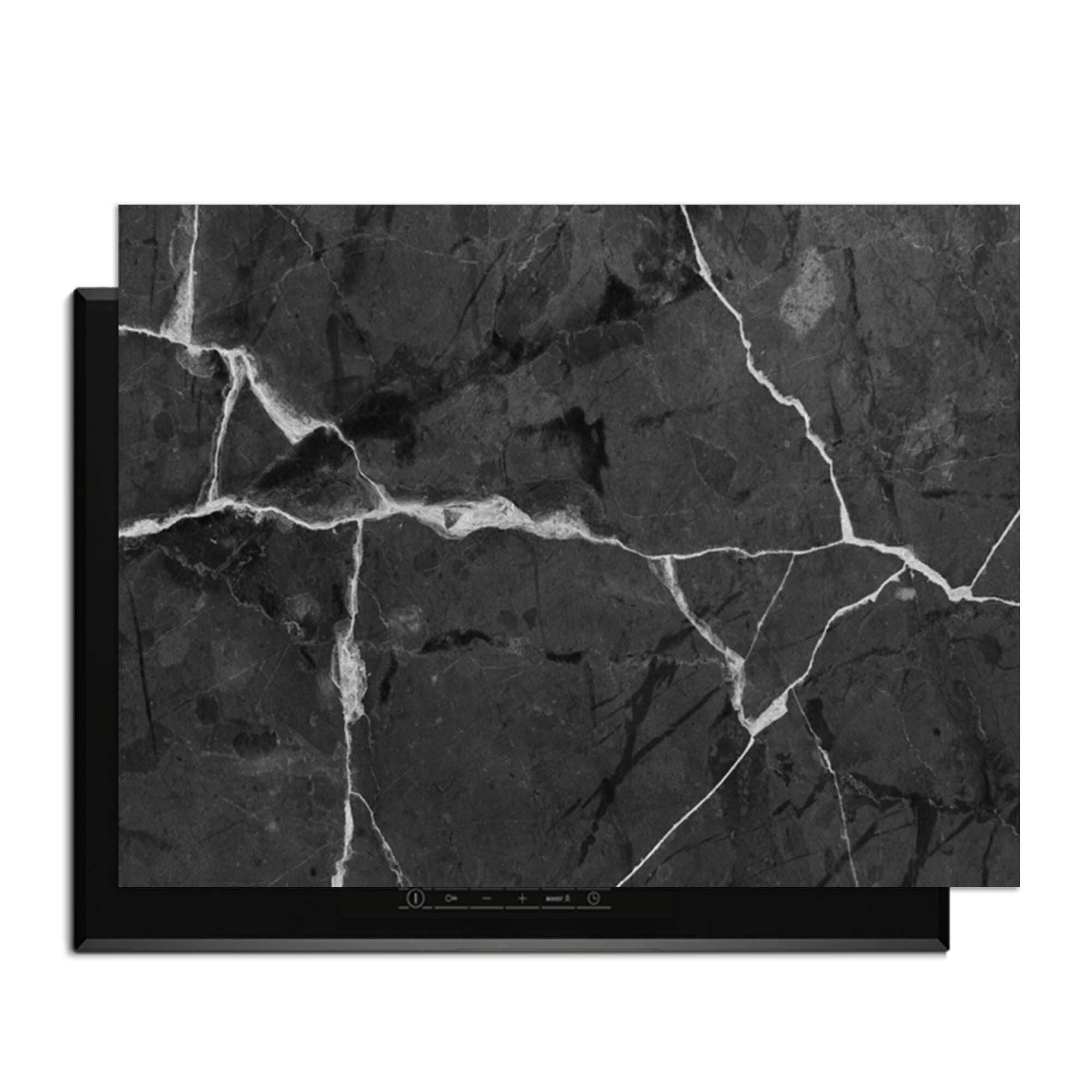 Marble Charcoal - Herdabdeckplatte für Induktionskochfelder mit einem eleganten schwarzen Marmor-Design.
