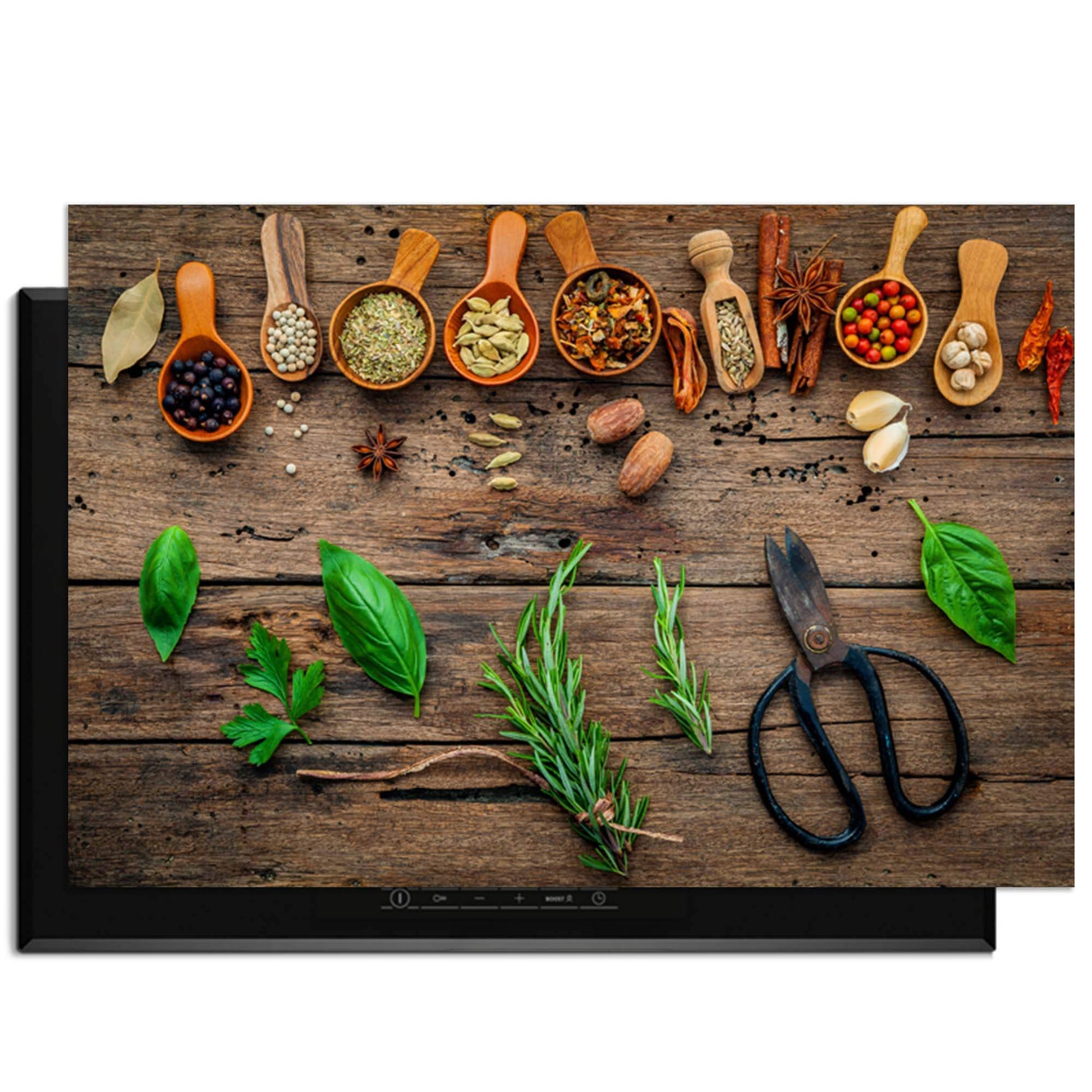 Roots & Recipes - Herdabdeckplatte mit Kräutern und Gewürzen auf einer heißen Platte.