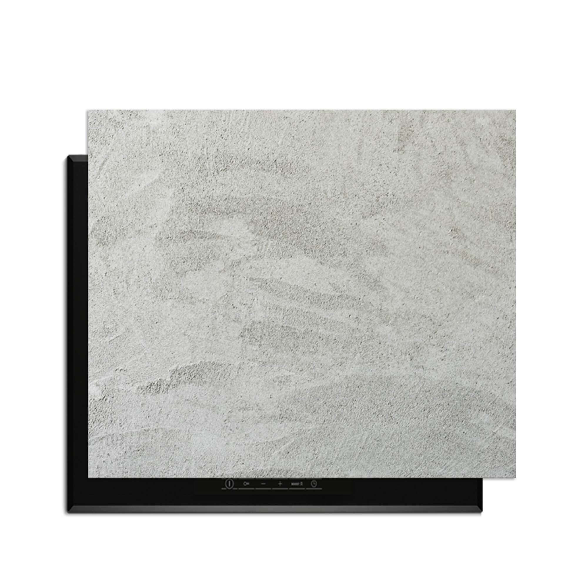 Soft Concrete Finish - Herdabdeckplatte auf einem Induktionskochfeld mit moderner Optik.