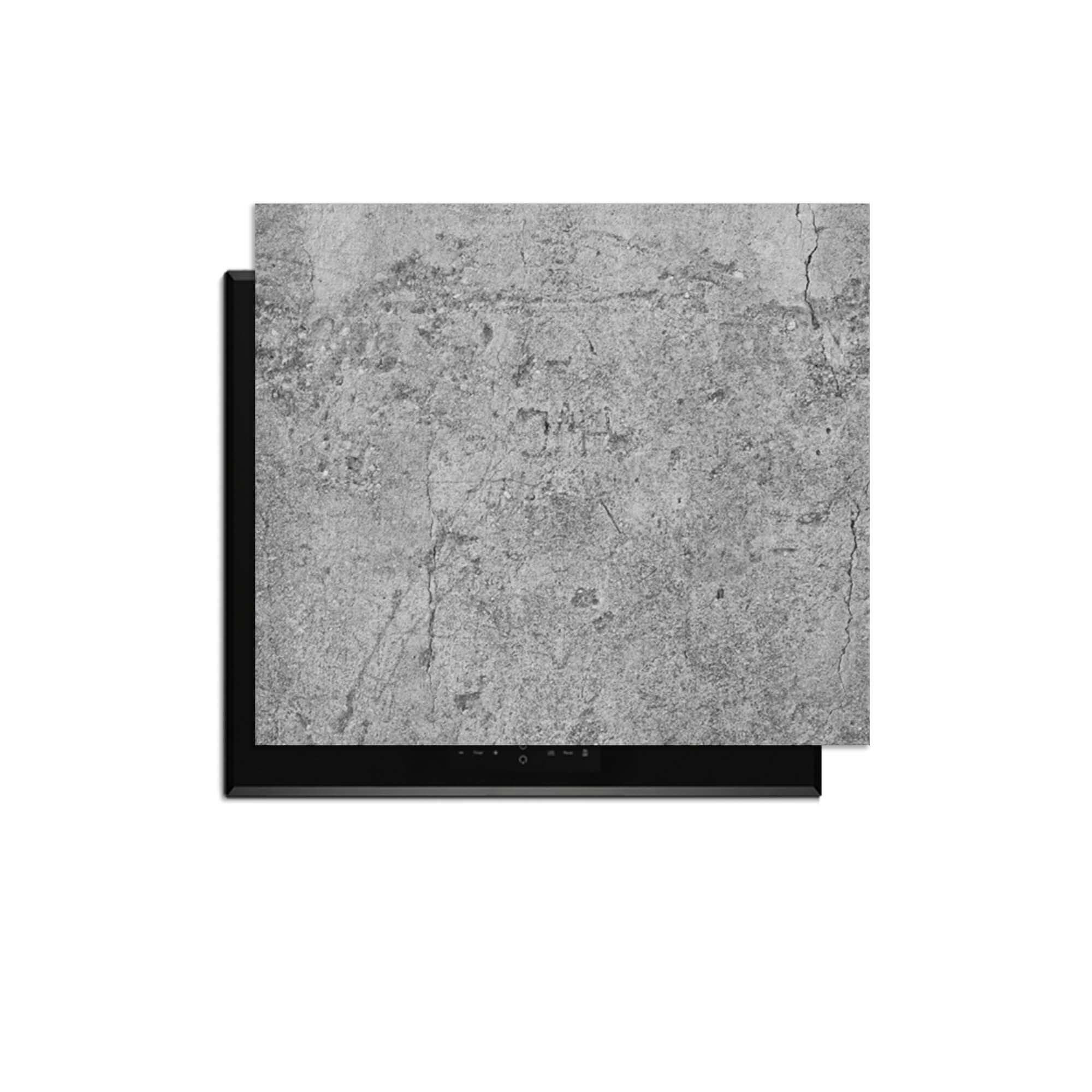 Urban Stone - Herdabdeckplatte auf einem Induktionskochfeld mit einem modernen, rauen Look.