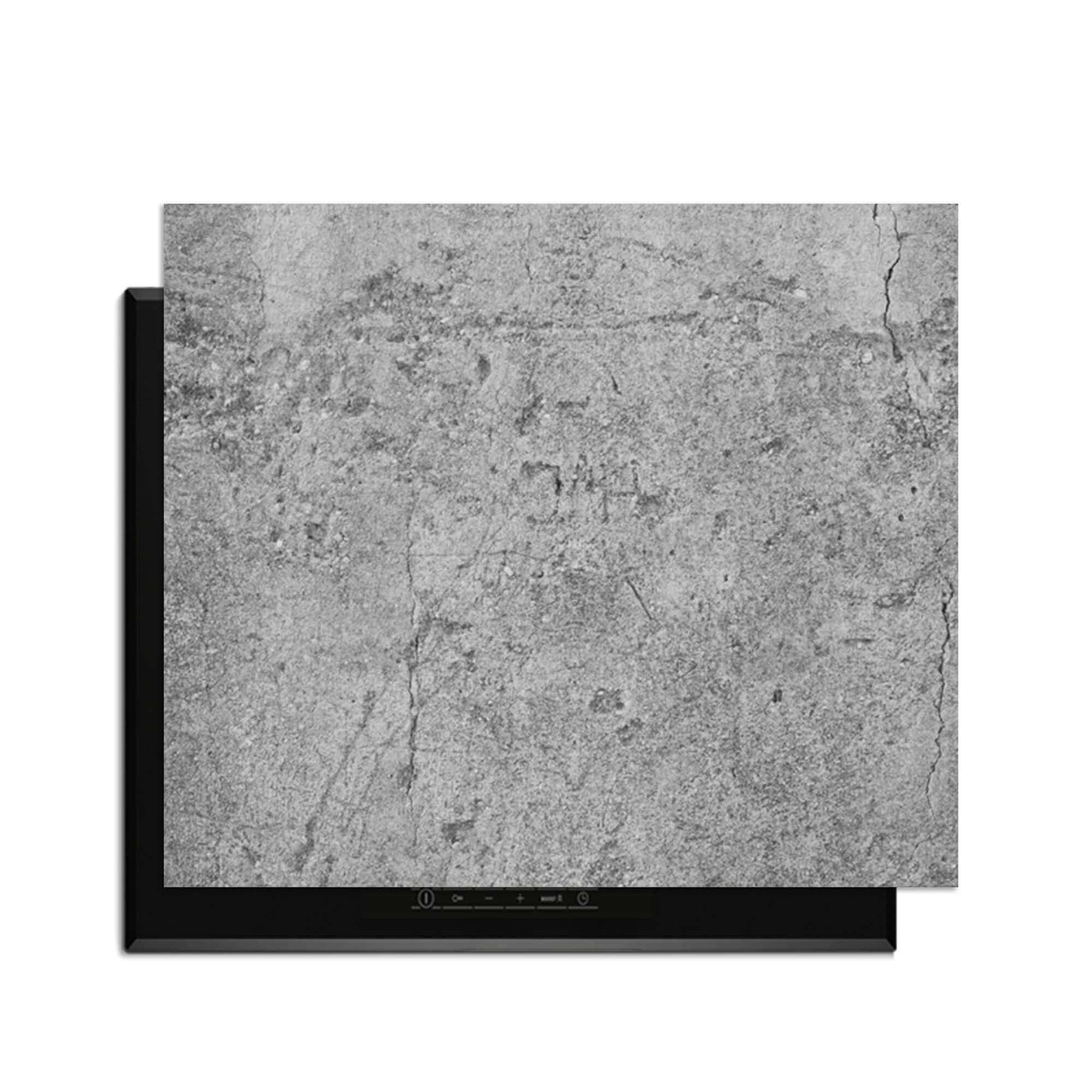 Urban Stone - Herdabdeckplatte auf einem Induktionskochfeld mit einem modernen, rauen Look.